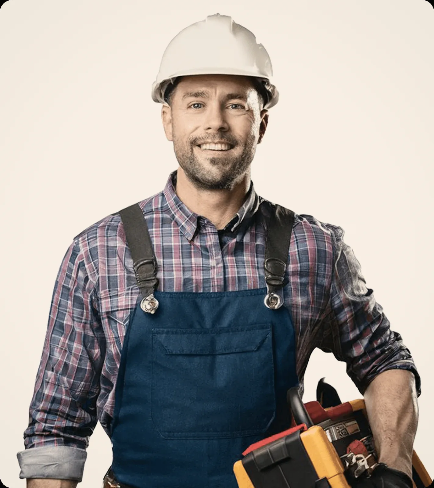 A man in a yellow helmet and checked shirt, arms crossed.
