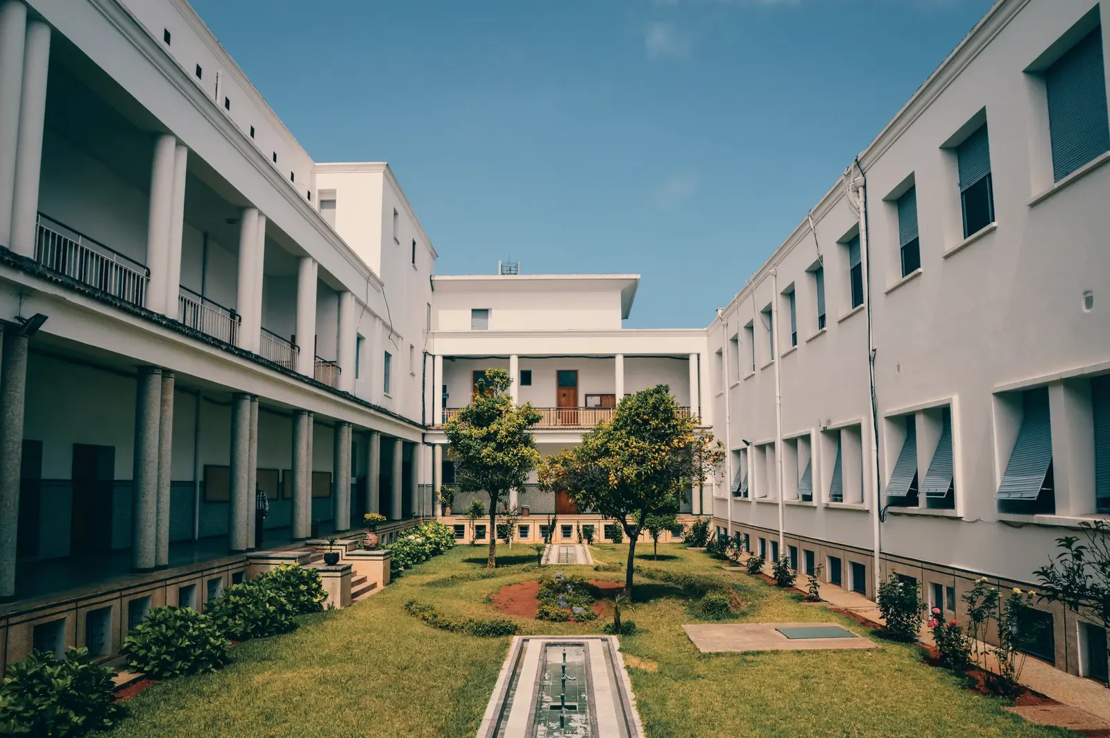 A school campus seen from the grounds in daylight, with no one posed for the camera.