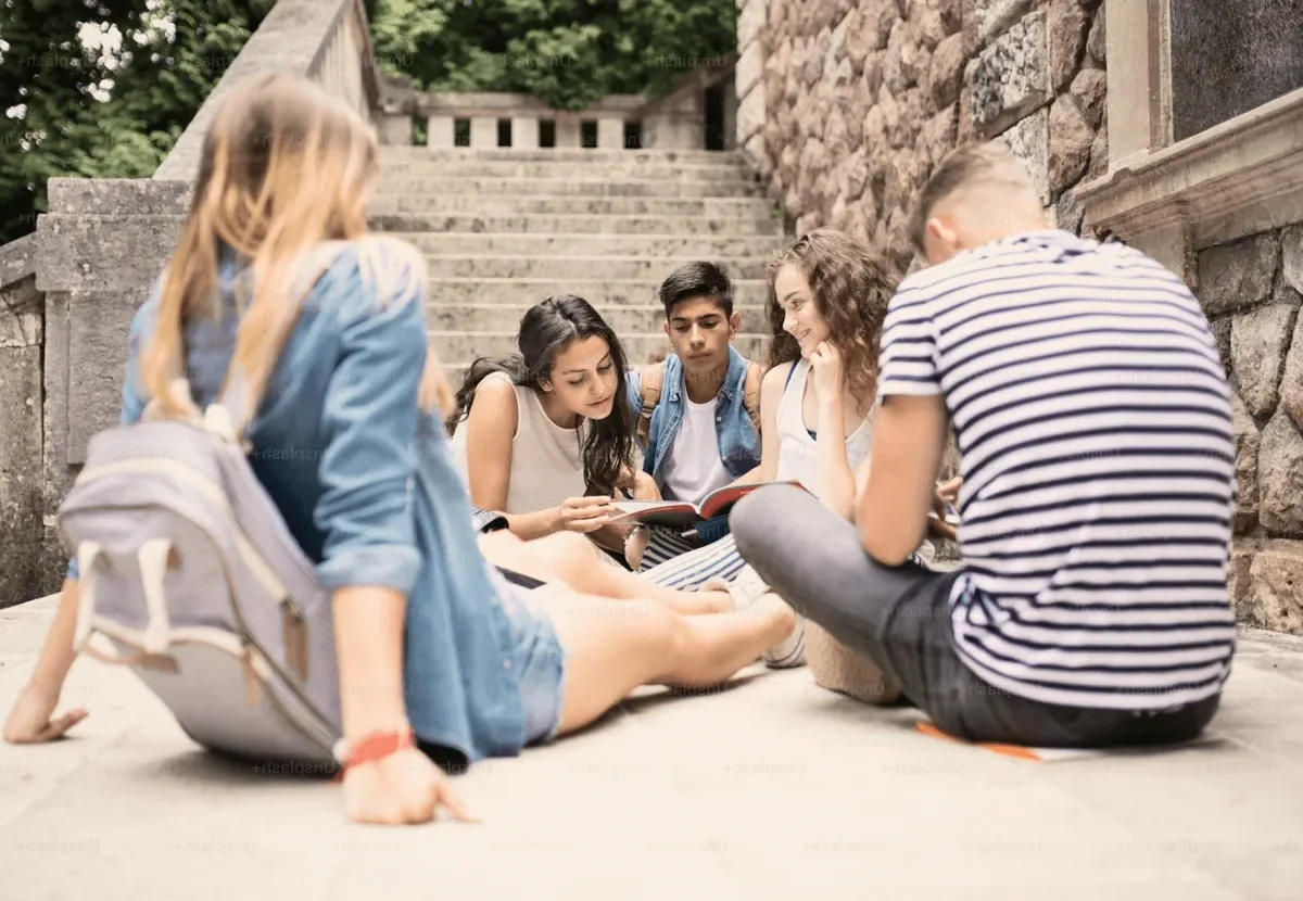 Students studying on the steps.