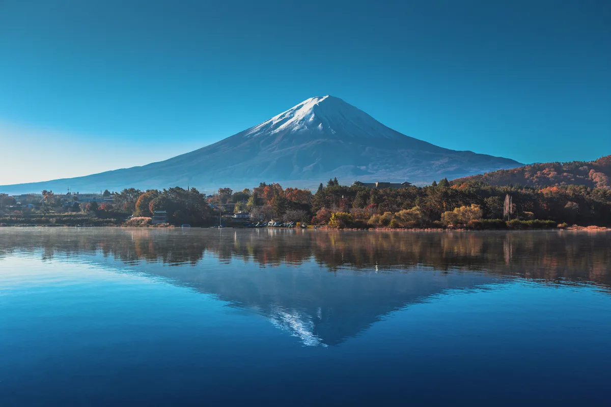 Mount Fuji reflected in a still lake.