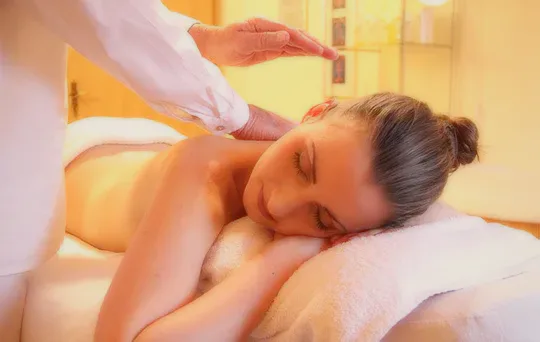 A woman resting during a massage.